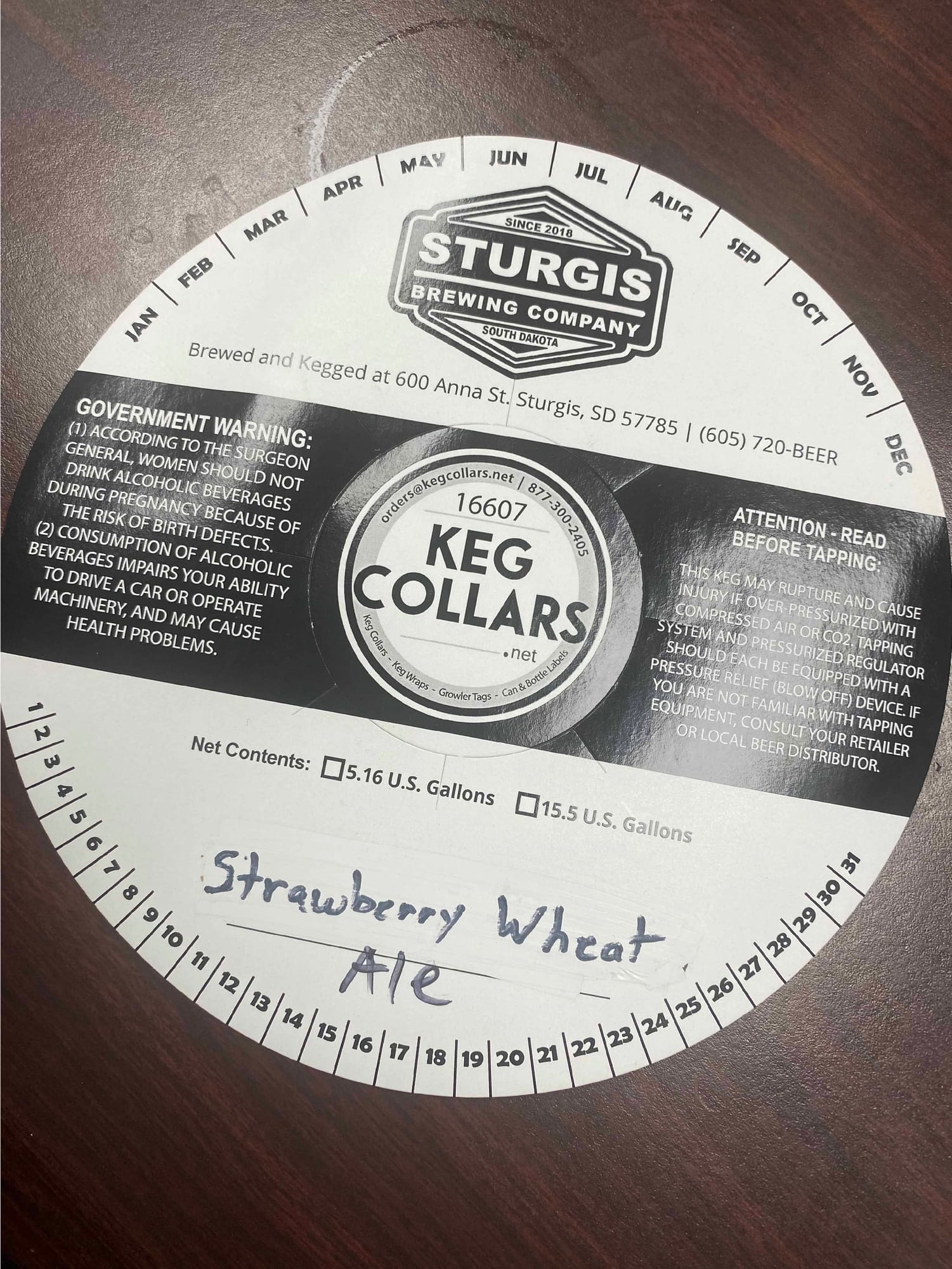 Strawberry Wheat Ale by Sturgis Brewing Company - beer label